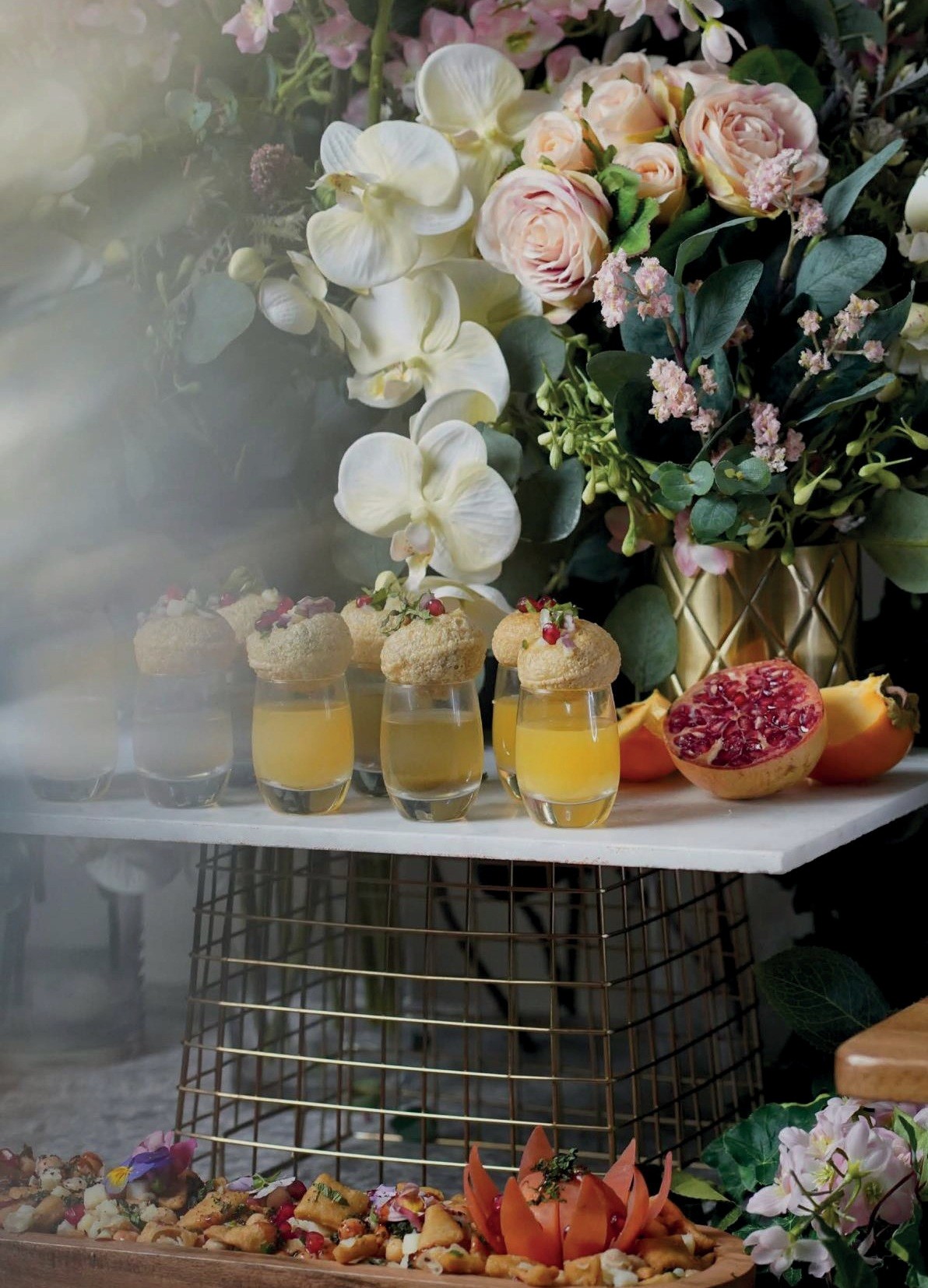 Elegant Indian canapés and welcome drinks presented with flowers